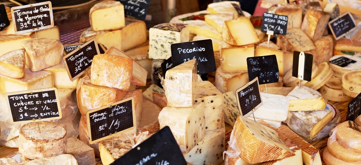 french cheeses at a market