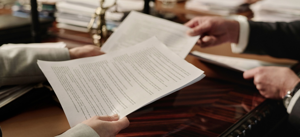 applicant-handing-over-banking-documents