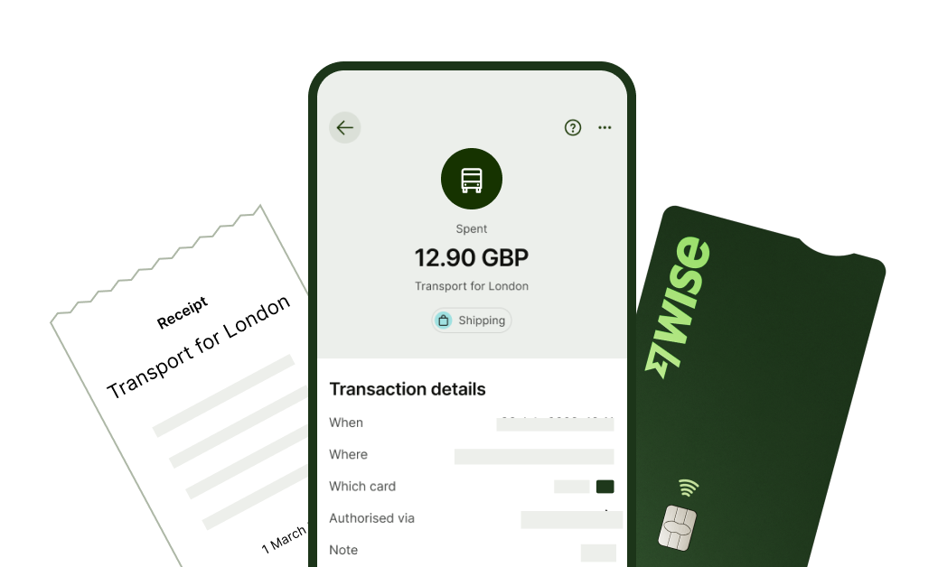 A man in a suit holding a phone with a screen of his Wise EUR balance